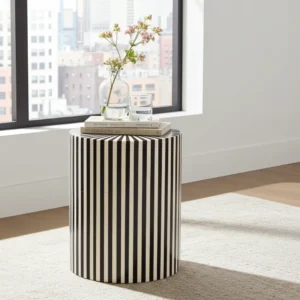 Black and white bone inlay accent table with vertical striped design