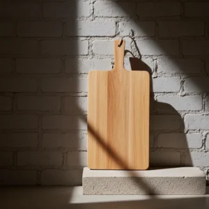 Handcrafted acacia wooden cutting board featuring easy-grip handle