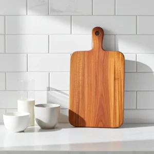 Acacia wood custom chopping board featuring 3 inch grip handle and natural grain