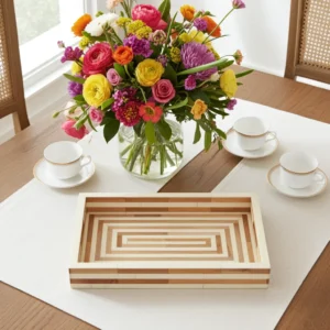 White and brown bone inlay tray showcasing geometric concentric maze artwork