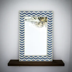 blue chevron bone inlay mirror with blue and white herringbone pattern