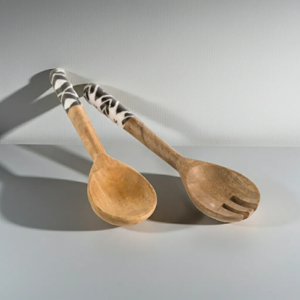 Wooden spoon and fork salad server set made from mango wood with enameled handles