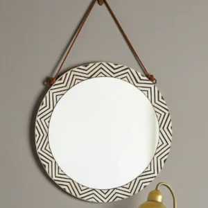 round bone inlay mirror with intricate chevron pattern frame