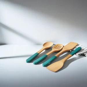 Four piece wooden utensil set with decorative enameled handles