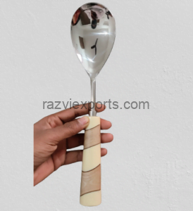 metal spoon with resin and wood handle