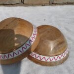 wooden round bowl with bone inlaid on edges