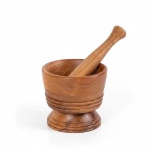 traditional wooden mortar and pestle for grinding spices and herbs