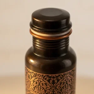 antique black engraved copper water bottle measuring 8 cm diameter and 28 cm height