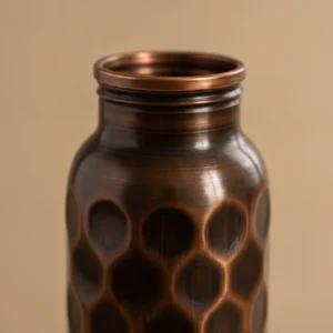 antique honeycomb hammered copper water bottle weighing 280 grams with 99%+ copper purity and purity test report available on request