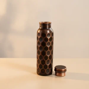 antique honeycomb hammered copper water bottle measuring 8 cm diameter and 28 cm height