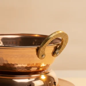decorative copper massage oil warmer for wellness and relaxation treatments
