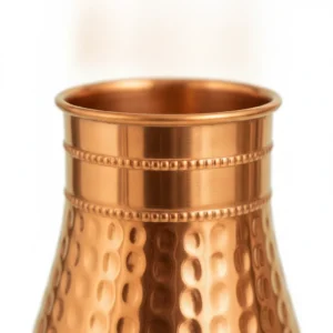 hammered copper water pot with matching lid and decorative beaded bands