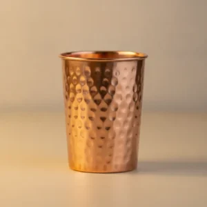 handcrafted plain hammered copper cup with classic hammered texture