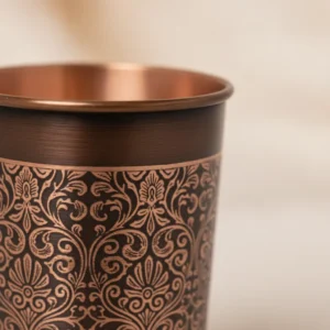 premium copper drinking set with dark antique finish, engraved design and 99%+ copper purity, test report available on request